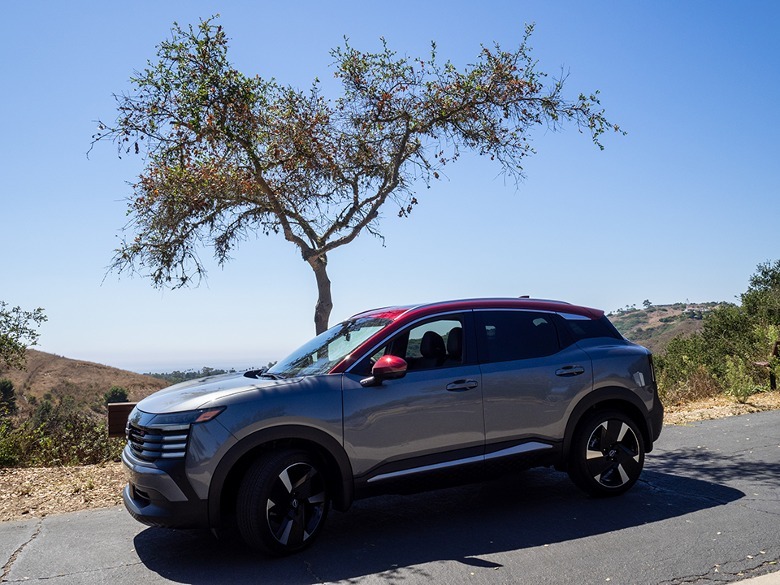 2025 Nissan Kicks SR parked under a tree