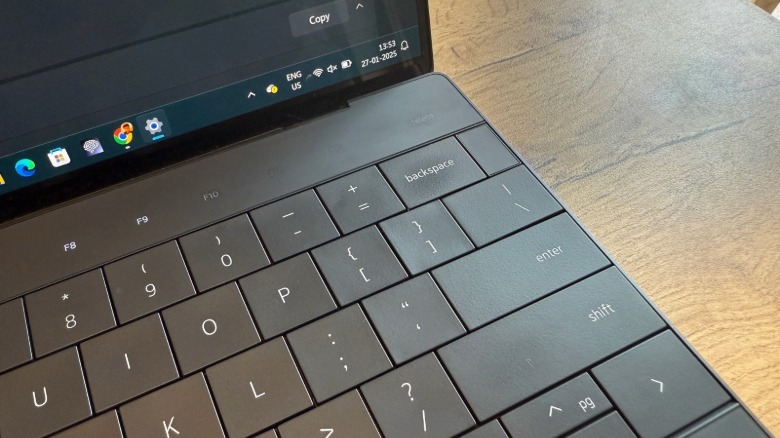 Close-up view of the capacitive function row bar on the Dell XPS 13.