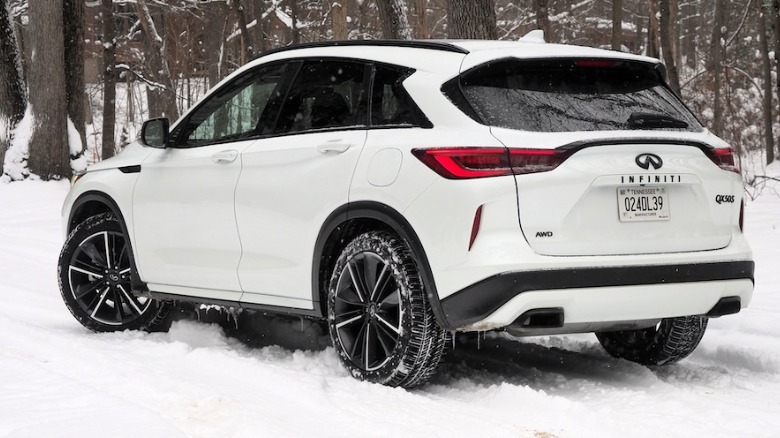 Infiniti QX50 rear 3/4 view parked in snow