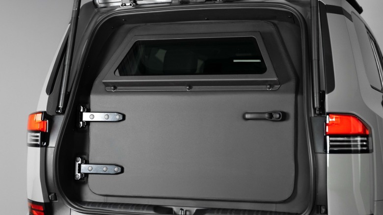 The rear bulkhead that protects passengers from the rear