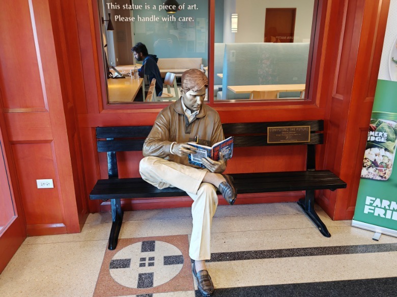 Statue of man reading