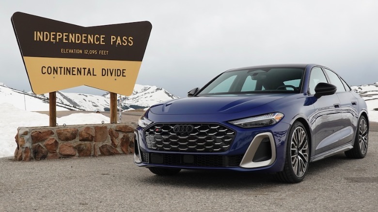 2025 Audi S5 front 3/4 view by road sign