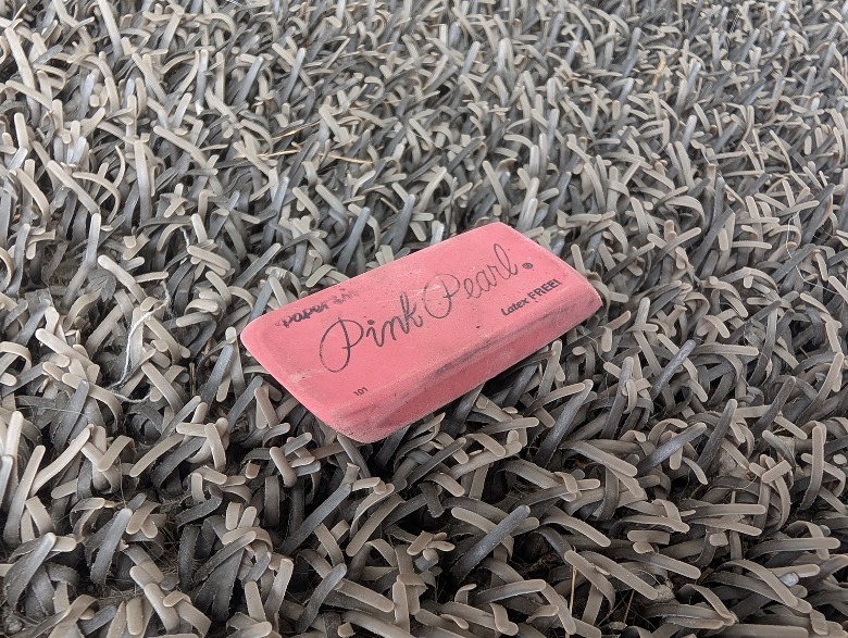 Eraser on mat.