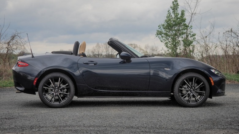 Miata in profile with roof down