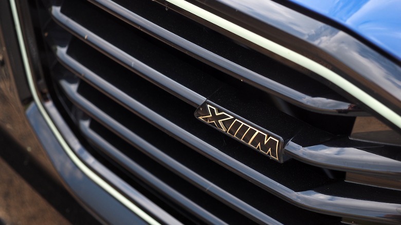 XM grille logo