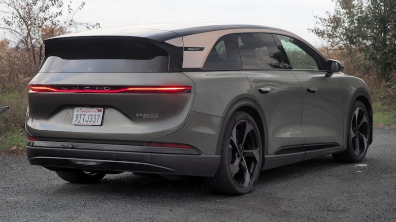 Rear quarter view of a Lucid Gravity parked