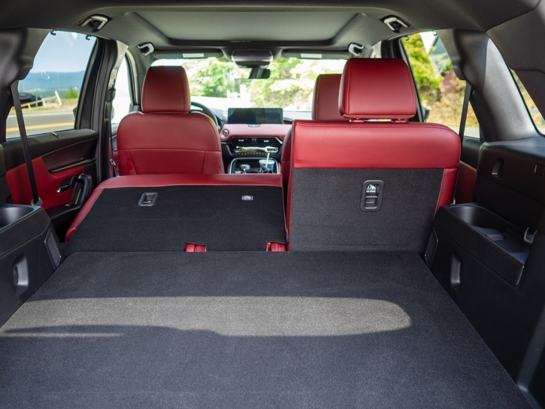 2025 Mazda CX-70 PHEV rear cargo area with half of rear bench folded down