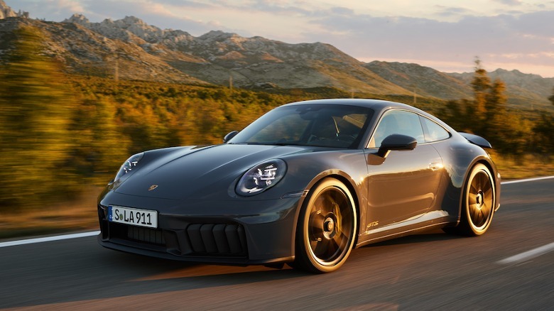 2025 911 Carrera GTS road driving sunset
