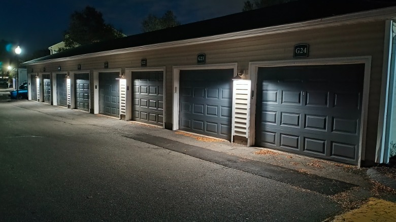 Photo take outdoors at night of garage doors