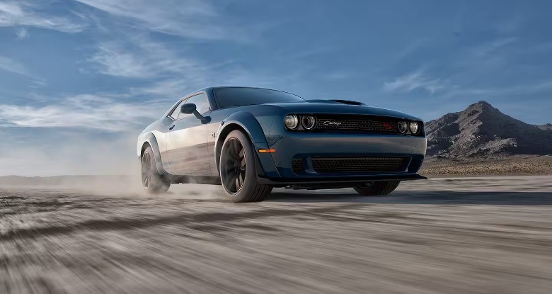 2023 Dodge Challenger driving on dirt