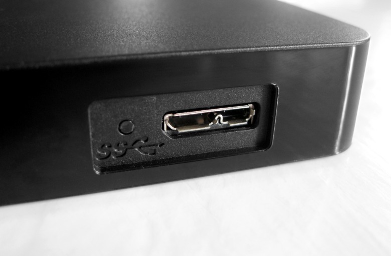 Closeup of USB Micro B socket with SuperSpeed Trident logo