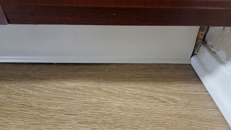 floor below kitchen cabinet after switchbot k10+ vacuums