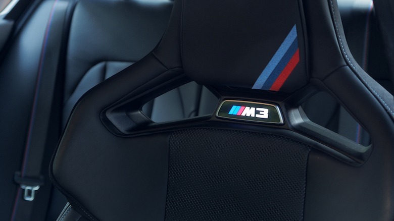 Glowing M3 logo in seat