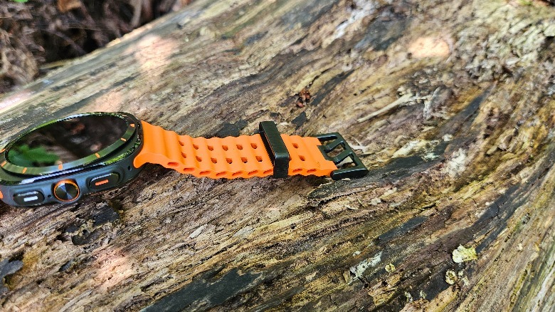 Samsung Galaxy Watch Ultra on a log showing the double clasp.