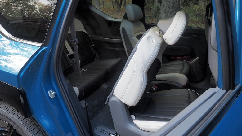 Second row seats tipped for third row access