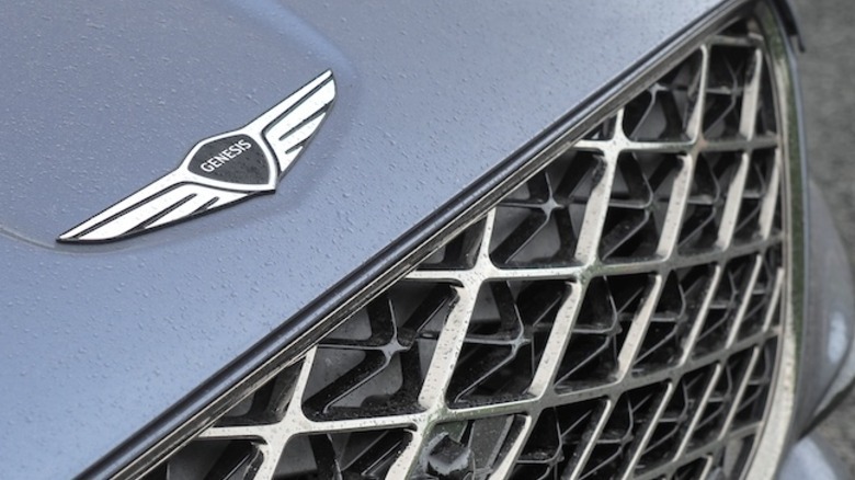 Genesis badge and front grille detail